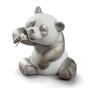 A Cheerful Panda Figurine. Silver Lustre